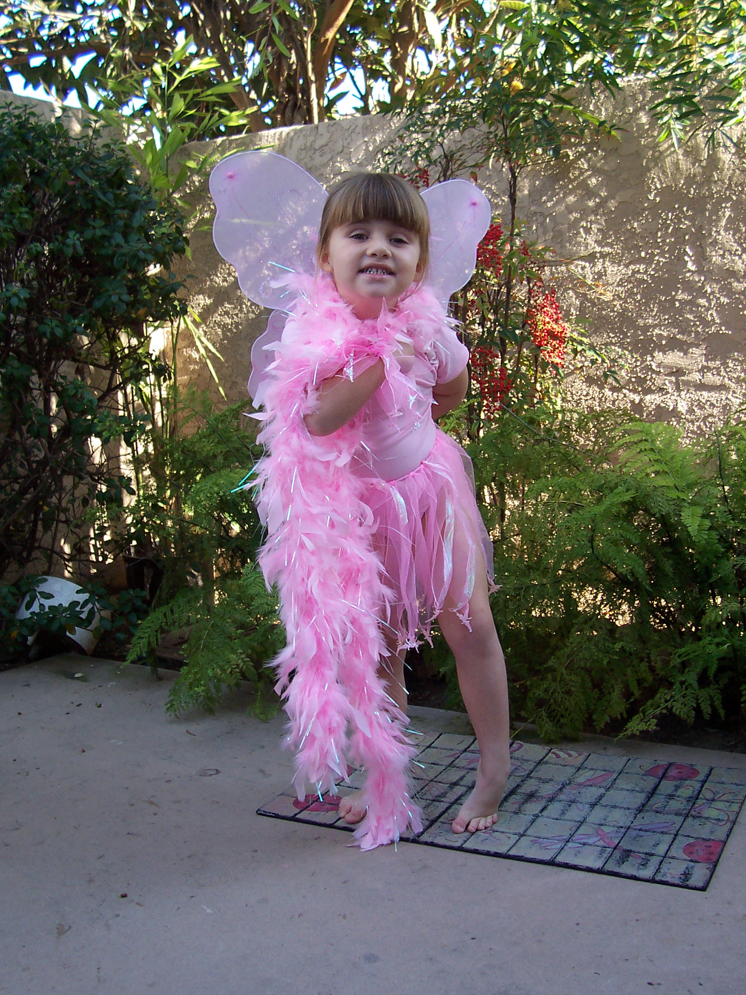 girl with wings and boa